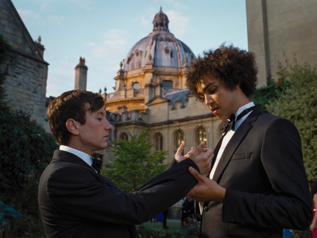 This image released by Amazon Prime Video shows Barry Keoghan, left, and Archie Madekwe in a scene from "Saltburn." (Amazon Prime Video via AP)