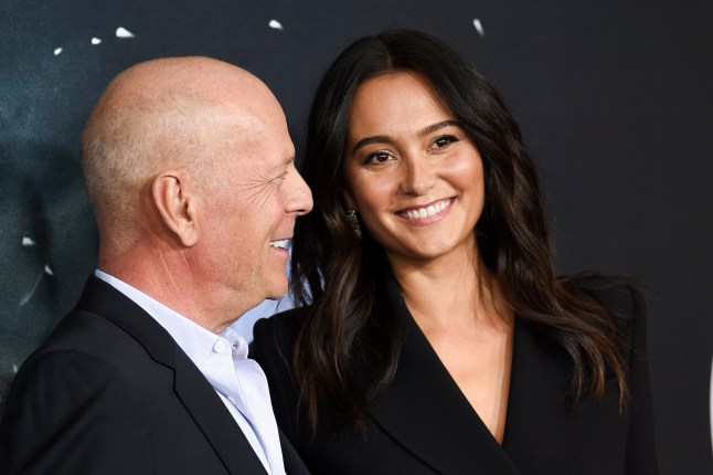 FILE - Actor Bruce Willis, left, and his wife Emma Heming Willis attend the premiere of "Glass" in New York on Jan. 15, 2019. Heming Willis is working on a guide to care giving that draws upon her experiences tending to her husband who has been diagnosed with frontotemporal dementia. Emma Heming Willis' book, currently untitled, is scheduled for 2025. (Photo by Evan Agostini/Invision/AP, File)