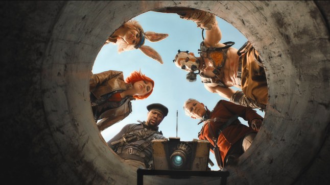Cate Blanchett as Lilith, Ariana Greenblatt as Tiny Tina, Kevin Hart as Roland, Florian Munteanu as Krieg and Jamie Lee Curtis as Tannis all pictured from below, looking down a well, in a scene from Borderlands