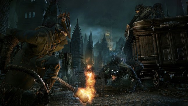 Bloodborne protagonist holding flaming torch in dark city as a wolf monster approaches