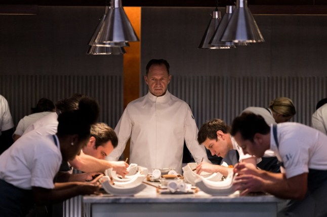 No Merchandising. Editorial Use Only. No Book Cover Usage. Mandatory Credit: Photo by Searchlight Pictures/Everett/REX/Shutterstock (14208417yj) THE MENU, Ralph Fiennes (center), 2022. ph: Eric Zachanowich / ? Searchlight Pictures / Courtesy Everett Collection Everett Collection - 2022