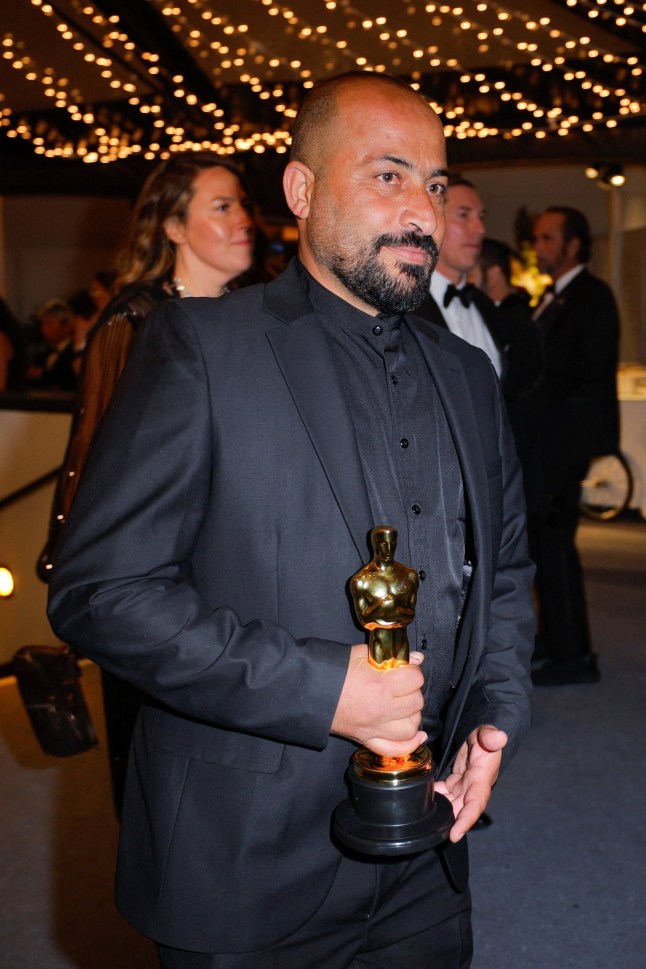 Hamdan Ballal holds the Oscar for Best Documentary Feature Film for "No Other Land" at the Governors Ball following the Oscars show at the 97th Academy Awards in Hollywood, Los Angeles, California, U.S., March 2, 2025. REUTERS/Mike Blake