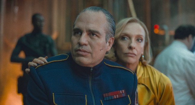 Undated film still from Mickey 17. Pictured: Mark Ruffalo as Kenneth Marshall and Toni Collette as Ylfa. See PA Feature SHOWBIZ Film Reviews. WARNING: This picture must only be used to accompany PA Feature SHOWBIZ Film Reviews. PA Photo. Picture credit should read: Warner Bros. Entertainment Inc. All Rights Reserved. NOTE TO EDITORS: This picture must only be used to accompany PA Feature SHOWBIZ Film Reviews.