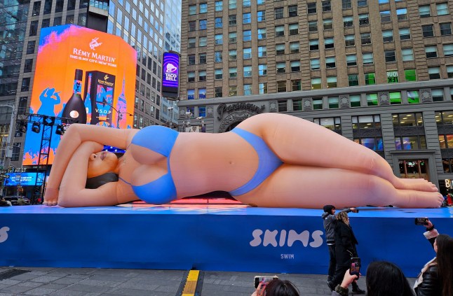 Mandatory Credit: Photo by Guerin Charles/ABACA/Shutterstock (15179745g) 60-foot balloon of Kim Kardashian to promote Skims new swim in Times Square, New York on March 4, 2025. Kim Kardashian Balloon in Times Square - NYC, New York City, United States - 04 Mar 2025