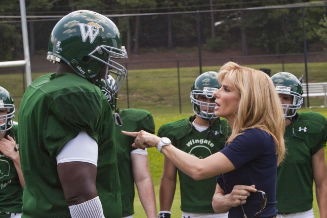 For Editorial Use Only Mandatory Credit: Photo by Ralph Nelson/THA/REX/Shutterstock (15044223w) QUINTON AARON as Michael Oher and SANDRA BULLOCK as Leigh Anne Tuohy in Alcon Entertainment's drama "The Blind Side," a Warner Bros. Pictures release. The Blind Side 2009