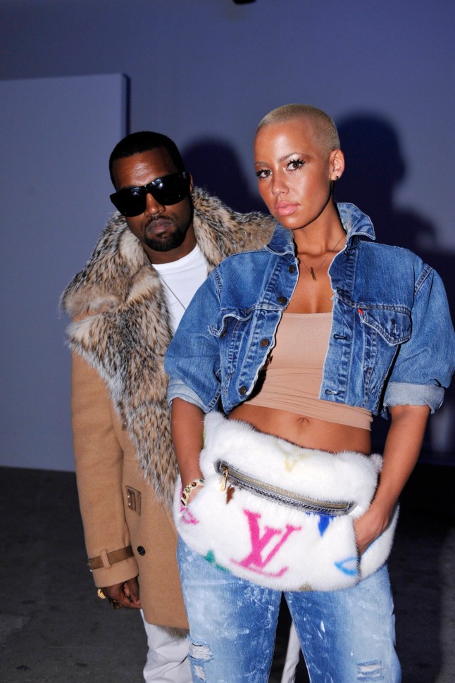 Kanye West (L) and Amber Rose backstage at Dunhill's fall 2010 menswear runway show at Palais de Tokyo. (Photo by Dominique Ma??tre/WWD/Penske Media via Getty Images)