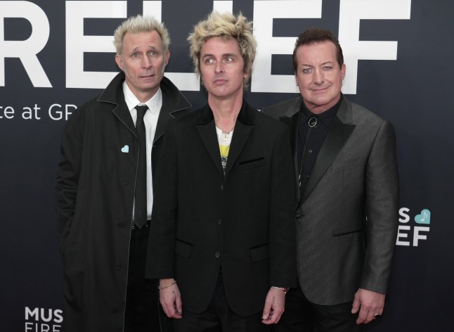 LOS ANGELES, CALIFORNIA - FEBRUARY 02: (FOR EDITORIAL USE ONLY) (L-R) Mike Dirnt, Billie Joe Armstrong, and Tr?? Cool of Green Day attend the 67th GRAMMY Awards at Crypto.com Arena on February 02, 2025 in Los Angeles, California. (Photo by Jeff Kravitz/FilmMagic)