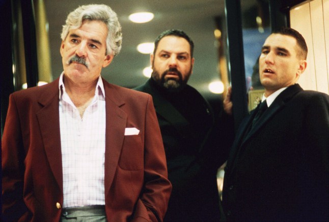 Editorial use only. No book cover usage. Mandatory Credit: Photo by Sebastian Pearson/Columbia/Ska/Kobal/REX/Shutterstock (5883520l) Dennis Farina, Vinnie Jones Snatch - 2000 Director: Guy Ritchie Columbia/Ska Films USA/UK Scene Still