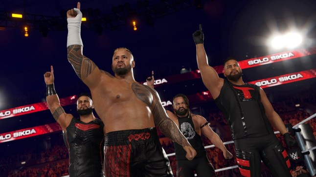 WWE 2K25 four members of The Bloodline standing in a wrestling pointing upwards