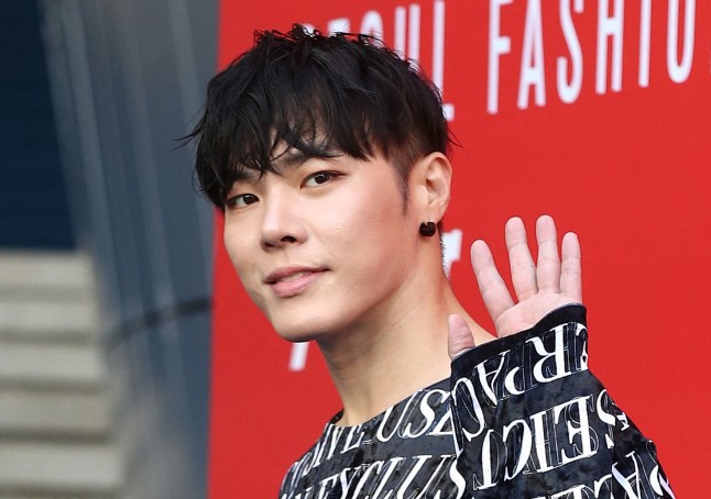 This undated picture released on March 10, 2025 by Yonhap news agency shows South Korean singer Wheesung posing for a photo during Seoul Fashion Week in Seoul. South Korean singer Wheesung was found dead at his residence, his management said on March 11, 2025, with police reportedly planning to conduct an autopsy to determine the 43-year-old's exact cause of death. (Photo by YONHAP / AFP) / - South Korea OUT / NO ARCHIVES - RESTRICTED TO SUBSCRIPTION USE (Photo by -/YONHAP/AFP via Getty Images)