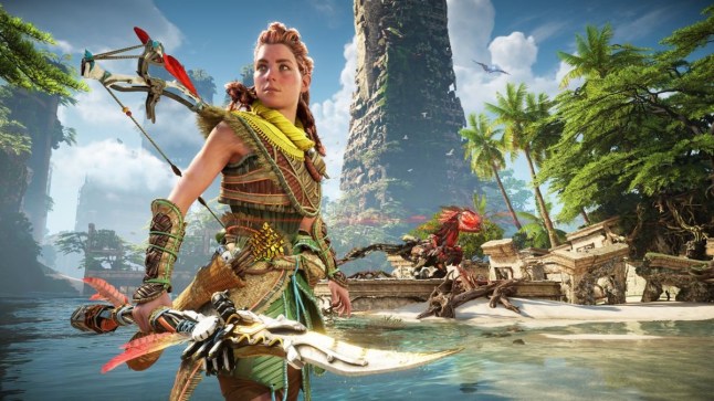 Horizon Forbidden West Aloy standing in front of ruins along beach