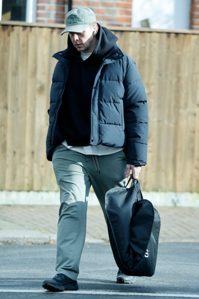 EXCLUSIVE: ** PREMIUM EXCLUSIVE ** ** PRINT FEES MUST BE AGREED BEFORE USE ** Cleaning Up His Act? A downcast Danny Jones Makes A Trip To The Dry Cleaners As It Emerges That His Wife Has Moved Out. The McFly star was spotted carrying a Reiss suit bag in west London as the fall out over his BRITs kiss with Maura Higgins continues. Over the weekend it emerged that his embarrassed wife, Georgia, has moved out of the family home following the incident. Pictured: danny jones Ref: BLU_S8216465 140325 EXCLUSIVE Picture by: / SplashNews.com Splash News and Pictures USA: 310-525-5808 UK: 020 8126 1009 eamteam@shutterstock.com World Rights