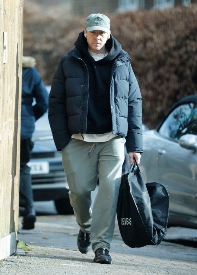 EXCLUSIVE: ** PREMIUM EXCLUSIVE ** ** PRINT FEES MUST BE AGREED BEFORE USE ** Cleaning Up His Act? A downcast Danny Jones Makes A Trip To The Dry Cleaners As It Emerges That His Wife Has Moved Out. The McFly star was spotted carrying a Reiss suit bag in west London as the fall out over his BRITs kiss with Maura Higgins continues. Over the weekend it emerged that his embarrassed wife, Georgia, has moved out of the family home following the incident. Pictured: danny jones Ref: BLU_S8216465 140325 EXCLUSIVE Picture by: / SplashNews.com Splash News and Pictures USA: 310-525-5808 UK: 020 8126 1009 eamteam@shutterstock.com World Rights