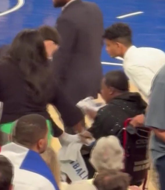 Moment Hollywood star vomits on basketball court during NBA game before being taken away in wheelchair Tracy Morgan