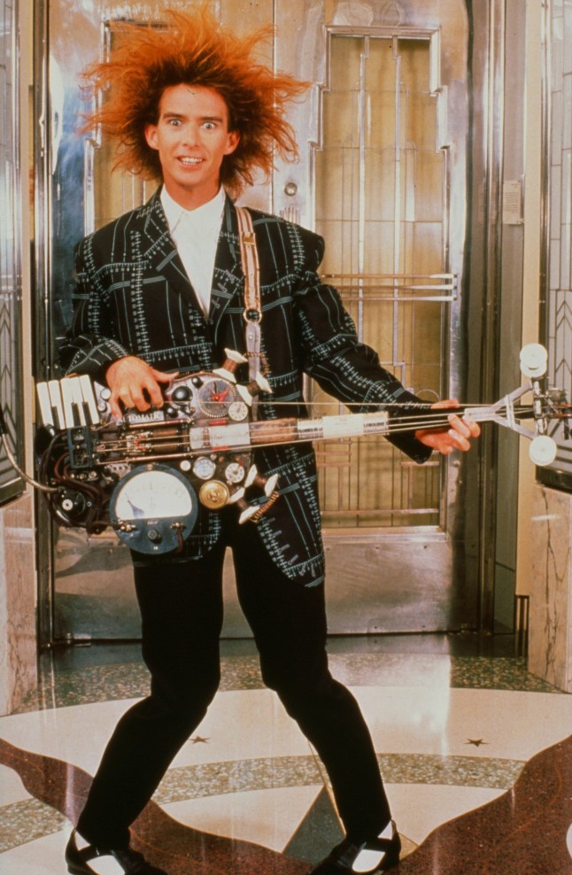 CIRCA 1988: Yahoo Serious plays a guitar in a scene from the Warner Bros movie "Young Einstein" circa 1988. (Photo by Hulton Archive/Getty Images)