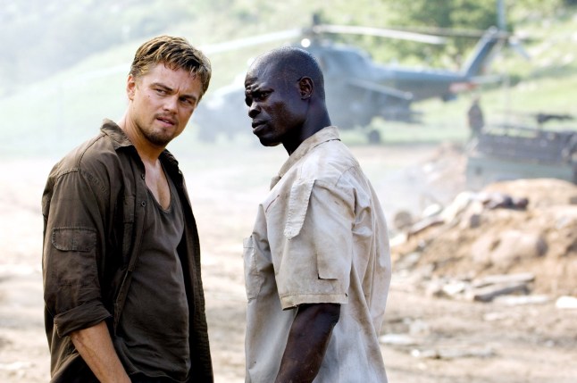 Editorial use only. No book cover usage. Mandatory Credit: Photo by Warner Br/Everett/REX/Shutterstock (635300q) 'Blood Diamond' - Leonardo DiCaprio, Djimon Hounsou 'Blood Diamond' film - 2007
