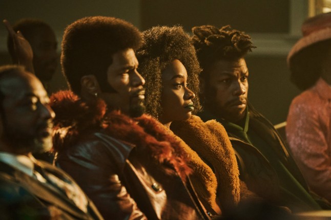 They Cloned Tyrone - (L to R) Jamie Foxx (Producer) as Slick Charles, Teyonah Parris as Yo-Yo and John Boyega as Fontaine and in They Cloned Tyrone. Cr. Parrish Lewis/Netflix ?? 2023.
