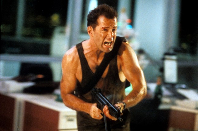FILE - MARCH 30: Bruce Willis is retiring from acting after being diagnosed with aphasia, a health condition that affects the ability to communicate. Bruce Willis running with automatic weapon in a scene from the film 'Die Hard', 1988. (Photo by 20th Century-Fox/Getty Images)