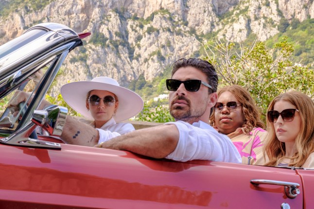 Blake Lively, Michele Morrone, Alex Newell and Anna Kendrick in Another Simple Favor, sitting in a car.