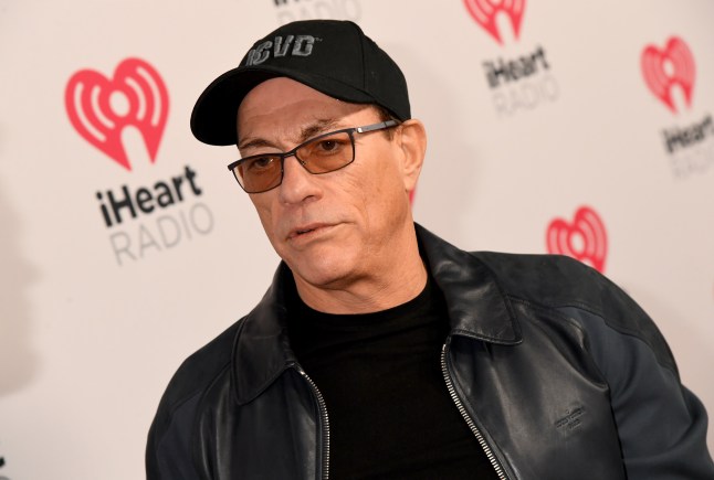 Jean-Claude Van Damme on the red carpet in a black leather jacket