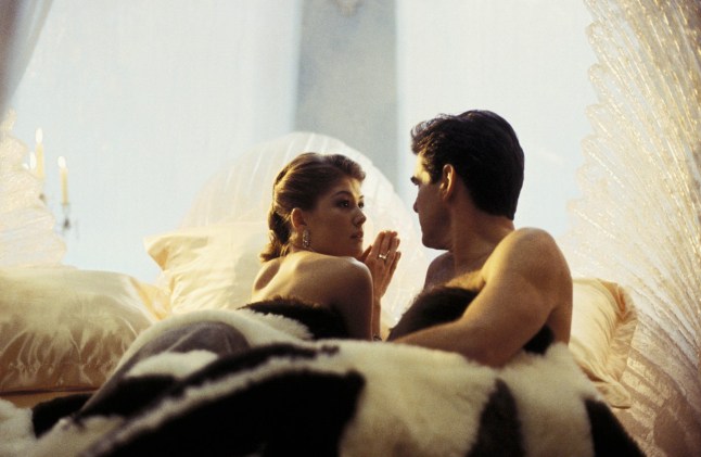 Editorial use only. No book cover usage. Mandatory Credit: Photo by Moviestore/REX/Shutterstock (1557809a) Die Another Day (James Bond), Rosamund Pike, Pierce Brosnan Film and Television