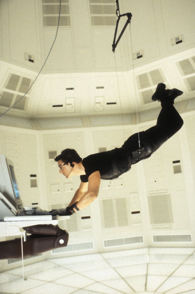 Editorial use only. No book cover usage. Mandatory Credit: Photo by Paramount/Kobal/REX/Shutterstock (5882632o) Tom Cruise Mission - Impossible - 1996 Director: Brian De Palma Paramount USA Scene Still Action/Adventure Mission Impossible (1996)