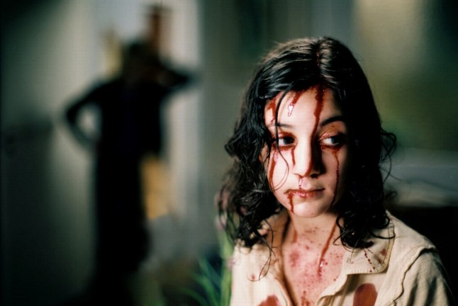 Editorial use only. No book cover usage. Mandatory Credit: Photo by Magnolia/Everett/REX/Shutterstock (831379a) 'Let the Right One In' (aka Lat Den Ratte Komma In) - Lina Leandersson, 2008. 'Let The Right One In' Film - 2008