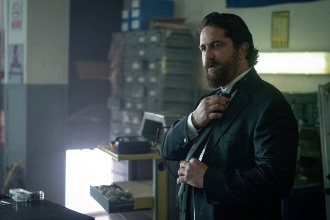 This image released by Lionsgate shows Gerard Butler in a scene from "Den of Thieves 2: Pantera." (Rico Torres/Lionsgate via AP)