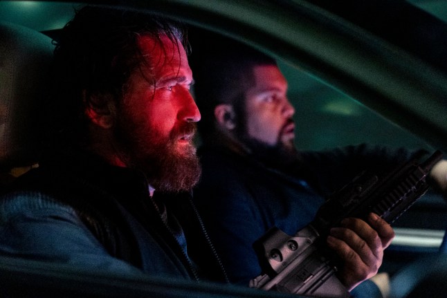 Gerard Butler, left, and O'Shea Jackson Jr. in a scene from "Den of Thieves 2: Pantera."