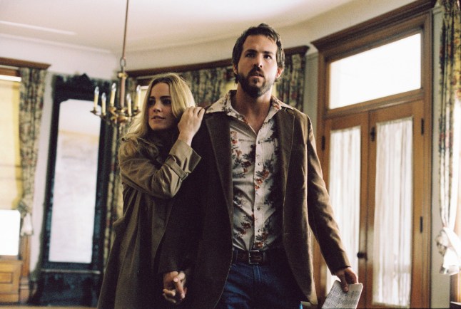 For Editorial Use - Credit Studio Only Mandatory Credit: Photo by THA/REX/Shutterstock (15077999n) Film Still from "The Amityville Horror" Melissa George, Ryan Reynolds ? 2005 MGM Photo Credit: Peter Iovino 'The Amityville Horror' - 2005