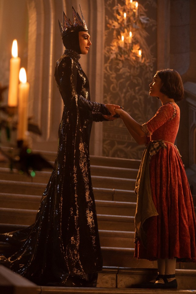Undated film still from Snow White. Pictured: Gal Gadot as Evil Queen and Rachel Zegler as Snow White. See PA Feature SHOWBIZ Film Reviews. WARNING: This picture must only be used to accompany PA Feature SHOWBIZ Film Reviews. PA Photo. Picture credit should read: Disney Enterprises, Inc./Giles Keyte. All Rights Reserved. NOTE TO EDITORS: This picture must only be used to accompany PA Feature SHOWBIZ Film Reviews.