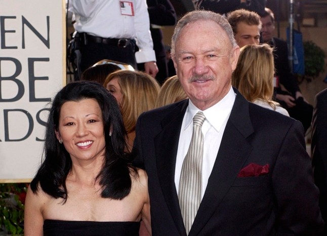 FILE - Actor Gene Hackman arrives with his wife, Betsy Arakawa, for the 60th Annual Golden Globe Awards in Beverly Hills, Calif., Jan. 19, 2003. (AP Photo/Mark J. Terrill, File)