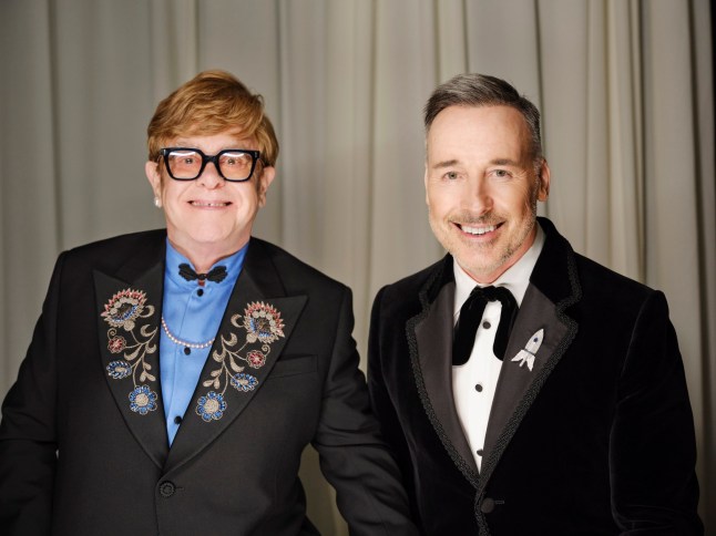 WEST HOLLYWOOD, CA - MARCH 02: (Exclusive COVERAGE) (EDITOR'S NOTE: IMAGE HAS BEEN DIGITALLY ALTERED) Elton John and David Furnish attend Elton John AIDS Foundation's 33rd Annual Academy Awards Viewing Party on March 2, 2025 in West Hollywood, California. (Photo by Maarten de Boer /Getty Images for the Elton John AIDS Foundation)