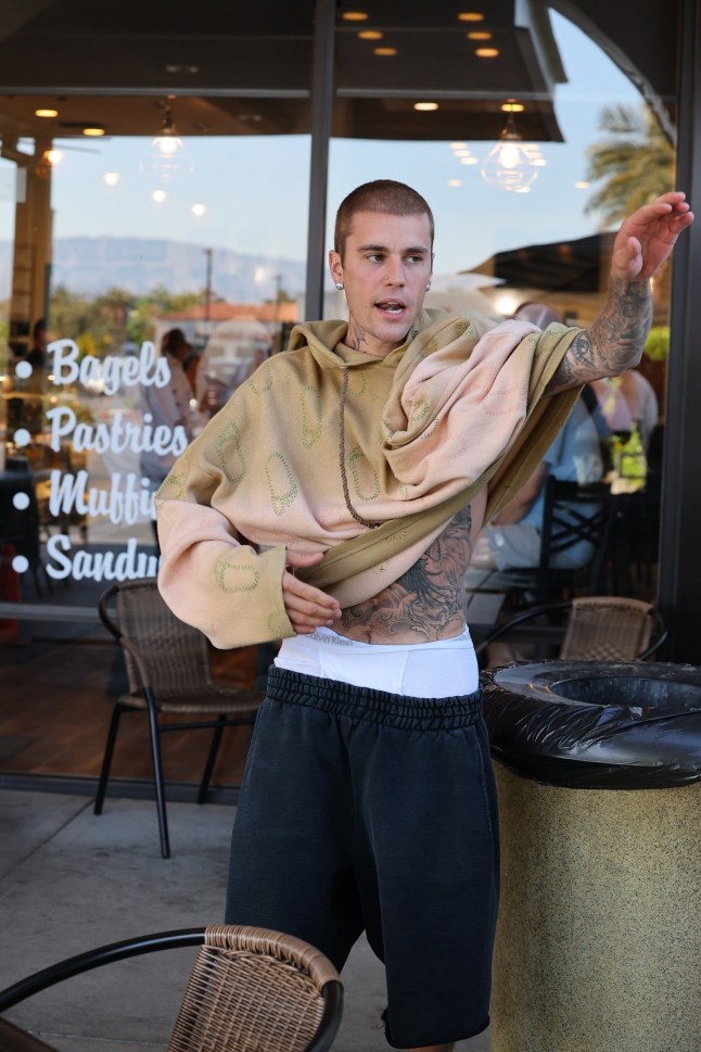 Palm Spring, CA - Justin Bieber displays his tattooed body as he steps out for coffee with friends in Palm Springs. Pictured: Justin Bieber BACKGRID USA 9 APRIL 2025 USA: +1 310 798 9111 / usasales@backgrid.com UK: +44 208 344 2007 / uksales@backgrid.com *UK Clients - Pictures Containing Children Please Pixelate Face Prior To Publication*