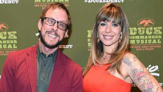 LAS VEGAS, NV - APRIL 15: Bassist Scott Shriner (L) of Weezer and his wife, writer Jillian Lauren, attend the "Duck Commander Musical" premiere at the Crown Theater at the Rio Hotel & Casino on April 15, 2015 in Las Vegas, Nevada. The musical is based on the book "The Duck Commander Family: How Faith, Family, and Ducks Built a Dynasty" by Willie and Korie Robertson from the television show "Duck Dynasty." (Photo by Ethan Miller/Getty Images)