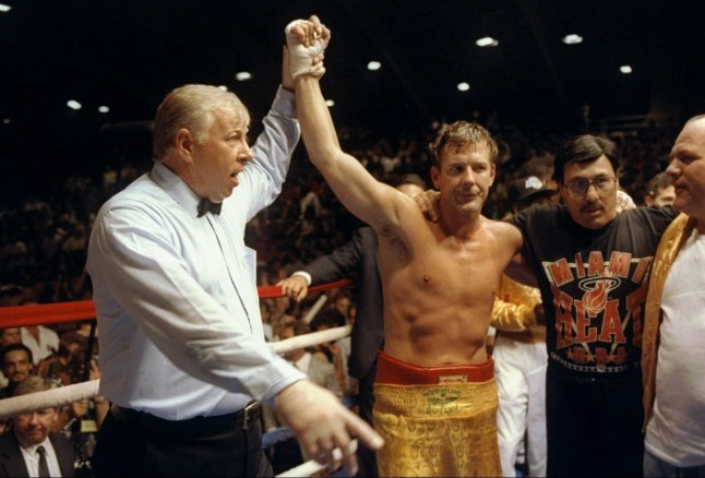 Undated: Mickey Rourke (center) has his hand raised in victory by the referee after his fight against Steve Powell. Mandatory Credit: Mark Morrison /Allsport