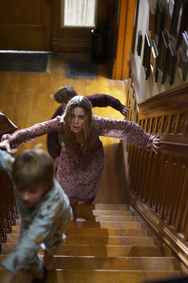 Editorial use only. No book cover usage. Mandatory Credit: Photo by Peter Iovino/Platinum Dunes/Radar/Dimension/Mgm/Kobal/REX/Shutterstock (5885045x) Melissa George The Amityville Horror - 2005 Director: Andrew Douglas Platinum Dunes/Radar/Dimension/MGM USA Scene Still Horror Amityville