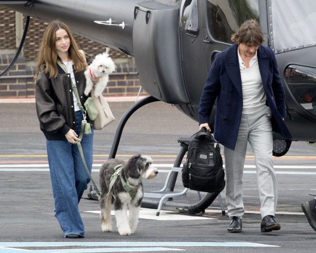 BGUK_3209109 - *PREMIUM-EXCLUSIVE* London, UNITED KINGDOM - MUST CALL FOR PRICING BEFORE USAGE - Tom & Ana, along with her dogs, arrived at the London heliport noted with little baggage after flying from Farnborough Airport at 16:22. A playback on the flight radar website (adsbexchange.com) shows Tom's jet, a Honda HA-420 HondaJet registered N77VA, landed at Farnborough Airport at 15:38 from Madrid. The aircraft departed Farnborough for Madrid the previous day (12th April) at 17:03. Pictured: Tom Cruise Ana de Armas BACKGRID UK 15 APRIL 2025 UK: +44 208 344 2007 / uksales@backgrid.com USA: +1 310 798 9111 / usasales@backgrid.com *Pictures Containing Children Please Pixelate Face Prior To Publication*