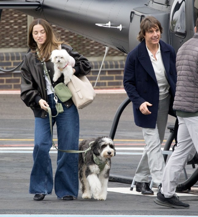 BGUK_3209109 - *PREMIUM-EXCLUSIVE* London, UNITED KINGDOM - MUST CALL FOR PRICING BEFORE USAGE - Tom & Ana, along with her dogs, arrived at the London heliport noted with little baggage after flying from Farnborough Airport at 16:22. A playback on the flight radar website (adsbexchange.com) shows Tom's jet, a Honda HA-420 HondaJet registered N77VA, landed at Farnborough Airport at 15:38 from Madrid. The aircraft departed Farnborough for Madrid the previous day (12th April) at 17:03. Pictured: Tom Cruise Ana de Armas BACKGRID UK 15 APRIL 2025 UK: +44 208 344 2007 / uksales@backgrid.com USA: +1 310 798 9111 / usasales@backgrid.com *Pictures Containing Children Please Pixelate Face Prior To Publication*