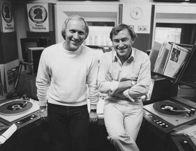 BBC Radio disc jockeys Colin Berry (left) and Ray Moore pictured in the studio, July 1983. (Photo by Tim Roney/Radio Times/Getty Images)