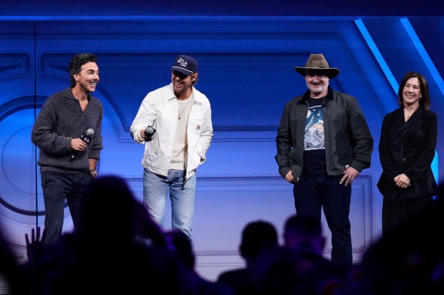 Film director Shawn Levy, left, and actor Ryan Gosling have a light moment on stage with director Dave Filoni and film producer Kathleen Kennedy during a fan convention called the Star Wars Celebration in Chiba, near Tokyo, Friday, April 18, 2025. (AP Photo/Hiro Komae)