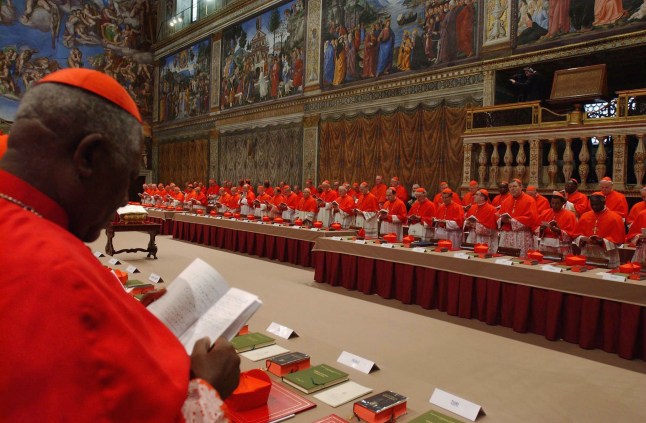 VATICAN CITY - APRIL 18: Cardinals of the Catholic Church attend the election conclave in the Sistine Chapel on April 18, 2005 at the Vatican, Vatican City. The 115 Cardinals will elect a successor to Pope John Paul II during the Conclave in the Chapel, at which point symbolic white smoke rising from the chimney will announce to the world that they have reached a decision. (Photo by Arturo Mari - Vatican Pool/ Getty Images)