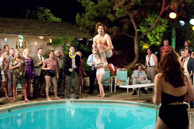 Will Ferrell as Ron Burgandy divebombs into a swimming pool at a party in Anchorman,The Legend Of Ron Burgundy