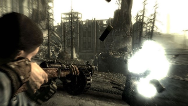 Fallout 3 player character firing a gun at an enemy