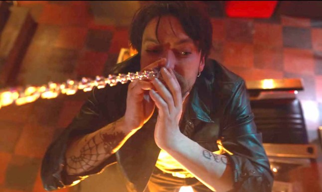 Richard Harmon as Erik Campbell in Final Destination: Bloodlines. He appears scared as a large chain is attached to his septum piercing