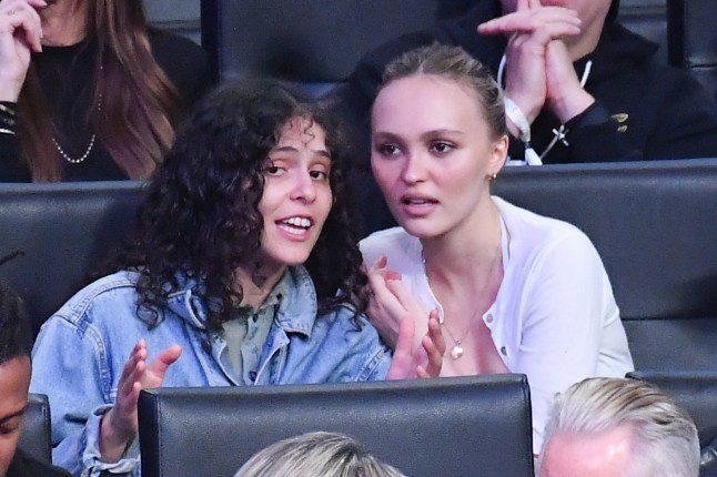 LOS ANGELES, CALIFORNIA - APRIL 30: Lily-Rose Depp and 070 Shake attend a basketball game between the Los Angeles Lakers and the Minnesota Timberwolves at Crypto.com Arena on April 30, 2025 in Los Angeles, California. NOTE TO USER: User expressly acknowledges and agrees that, by downloading and or using this photograph, User is consenting to the terms and conditions of the Getty Images License Agreement. (Photo by Allen Berezovsky/Getty Images)