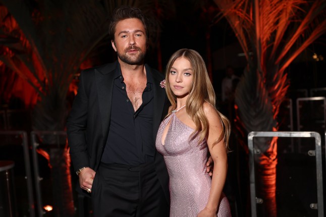 BEVERLY HILLS, CALIFORNIA - MARCH 02: EXCLUSIVE COVERAGE (L-R) Brandon Sklenar and Sydney Sweeney attend the 2025 Vanity Fair Oscar Party Hosted By Radhika Jones at Wallis Annenberg Center for the Performing Arts on March 02, 2025 in Beverly Hills, California. (Photo by Matt Winkelmeyer/VF25/WireImage for Vanity Fair)