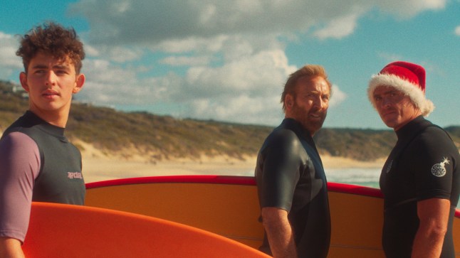Undated film still from The Surfer. Pictured: Finn Little as The Kid and Nicolas Cage as The Surfer. See PA Feature SHOWBIZ Film Reviews. WARNING: This picture must only be used to accompany PA Feature SHOWBIZ Film Reviews. PA Photo. Picture credit should read: Vertigo Releasing. All Rights Reserved. NOTE TO EDITORS: This picture must only be used to accompany PA Feature SHOWBIZ Film Reviews.