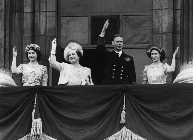 403157 04: FILE PHOTO From left to right, Princess Elizabeth, Queen Elizabeth, King George VI, and Princess Margaret Rose wave from the balcony of Buckingham Palace August 15, 1945 on VJ Day in London, England. The Queen Mother died in her sleep March 30, 2002 at the age of 101. (Photo by Getty Images)