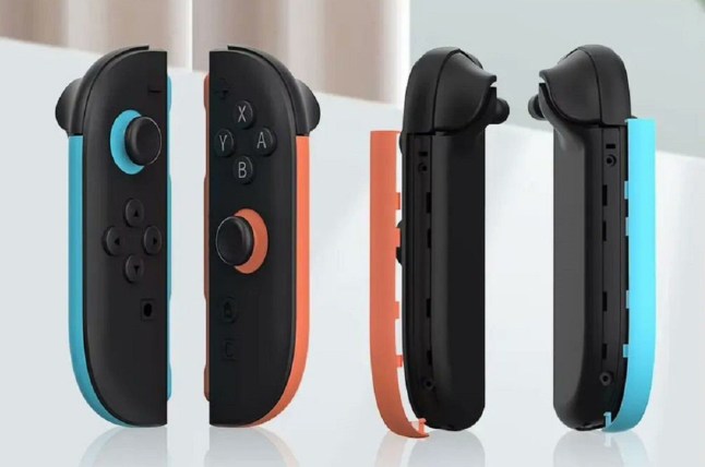 Nintendo switch 2 Joy-Con 2 controllers with attachable light blue and orange coloured strips